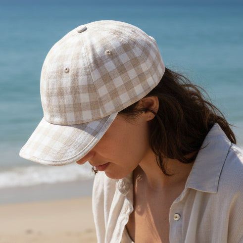 Plaid patterned cap on a white background