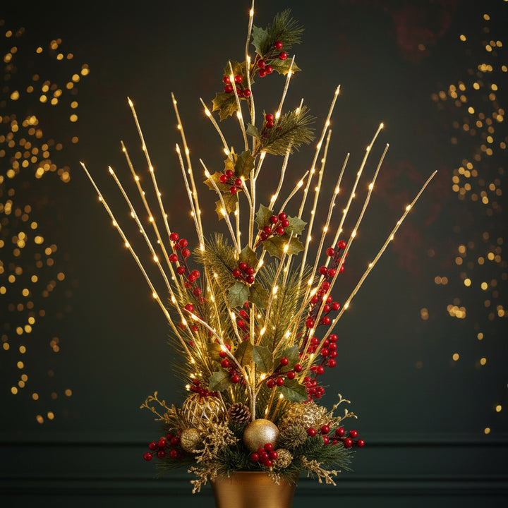Decorative gold branch with lights on a white background