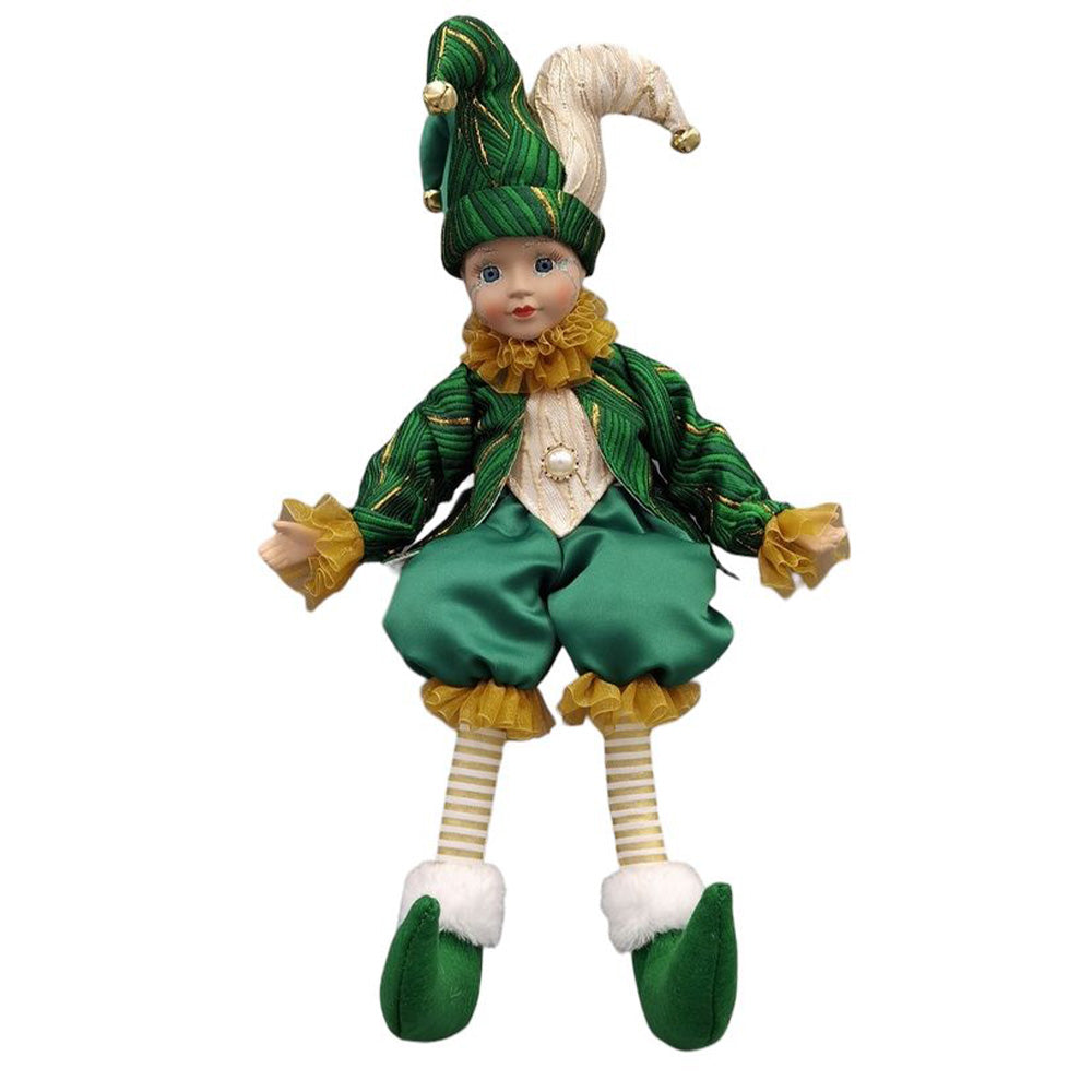 Elf doll in green and yellow outfit on a white background