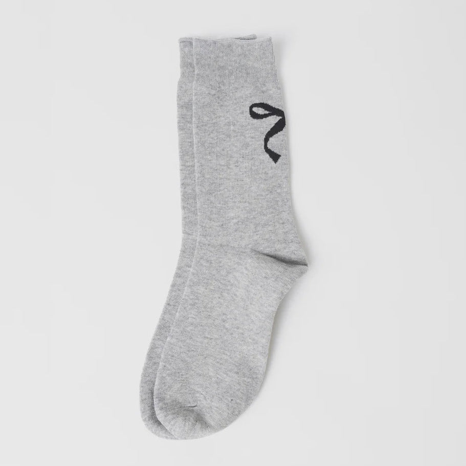 Gray sock with a black logo on a light gray background