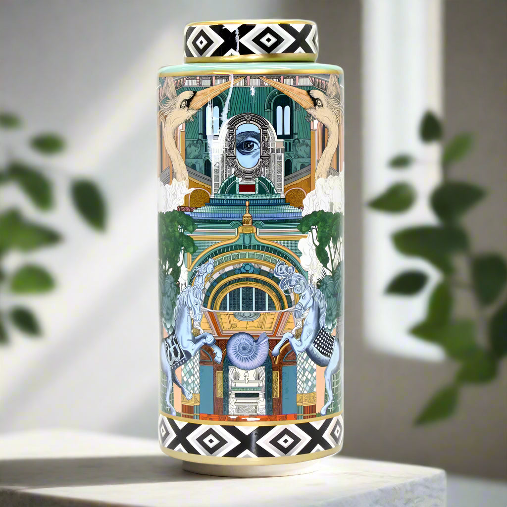 Decorative cylindrical jar with artistic design and geometric patterns on a white background