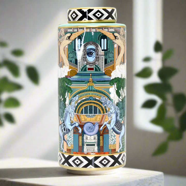 Decorative cylindrical jar with artistic design and geometric patterns on a white background