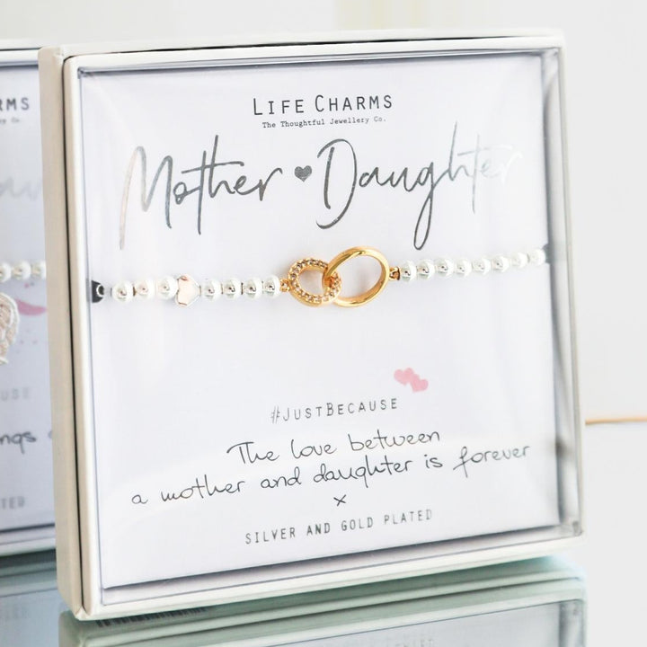Life Charms Mother Daughter jewelry set with card on a white background