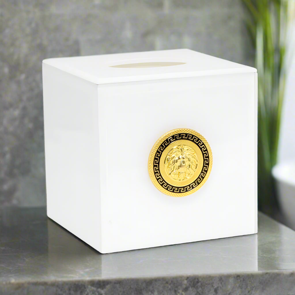 White tissue box cover with a gold lion emblem on a white background