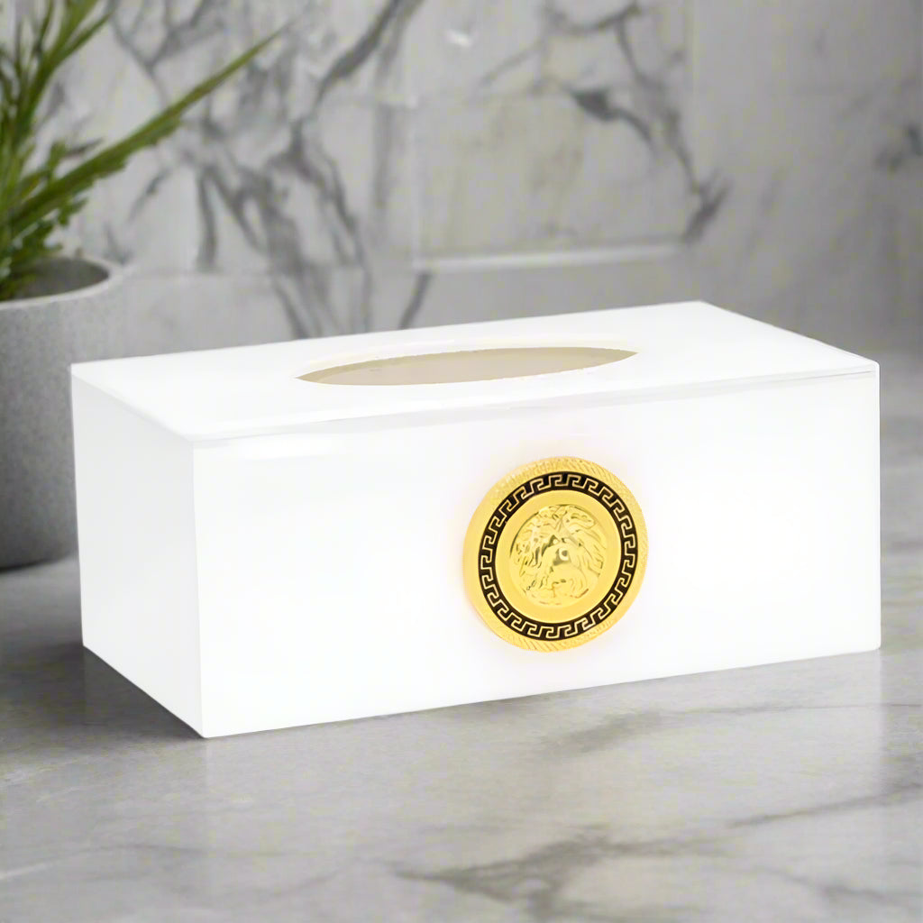 White tissue box cover with a gold lion emblem on a white background
