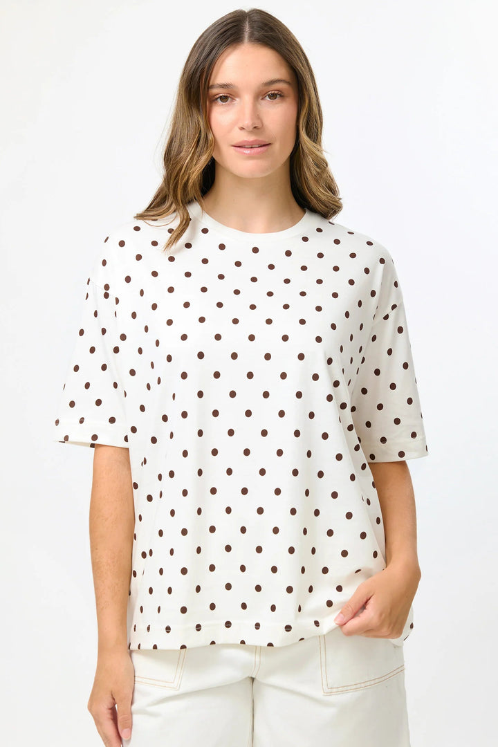 polka dot tee on lady on white background