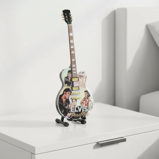 Elvis Presley-themed guitar with images of the musician on a white background
