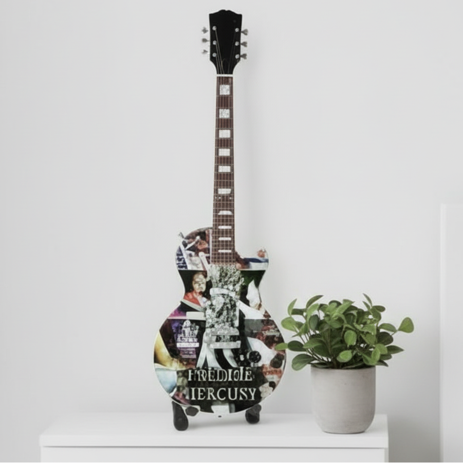 Guitar-shaped toy with Freddie Mercury design on a white background