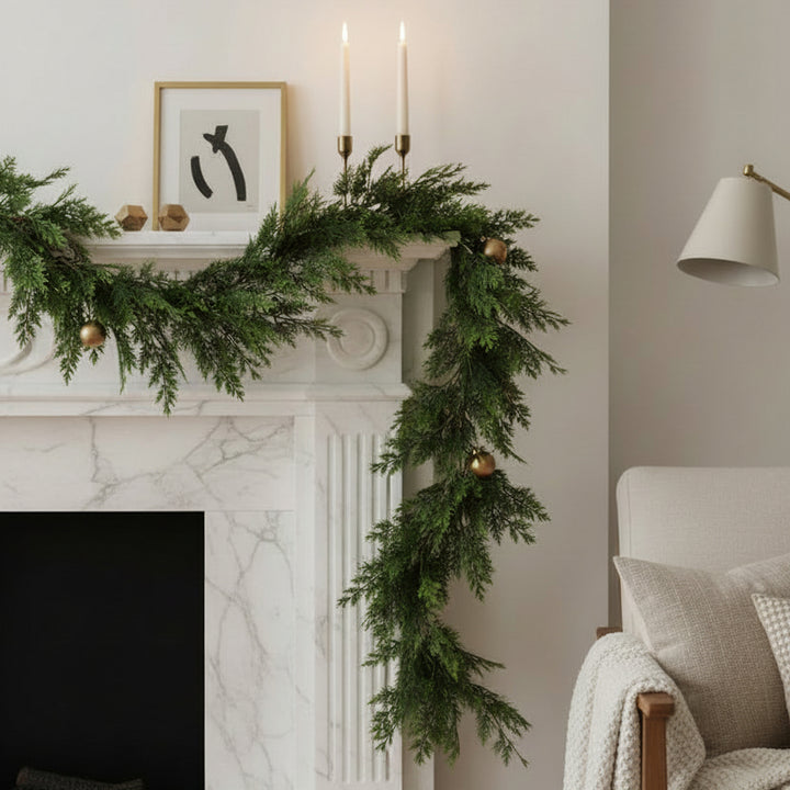 Artificial greenery garland on a white background