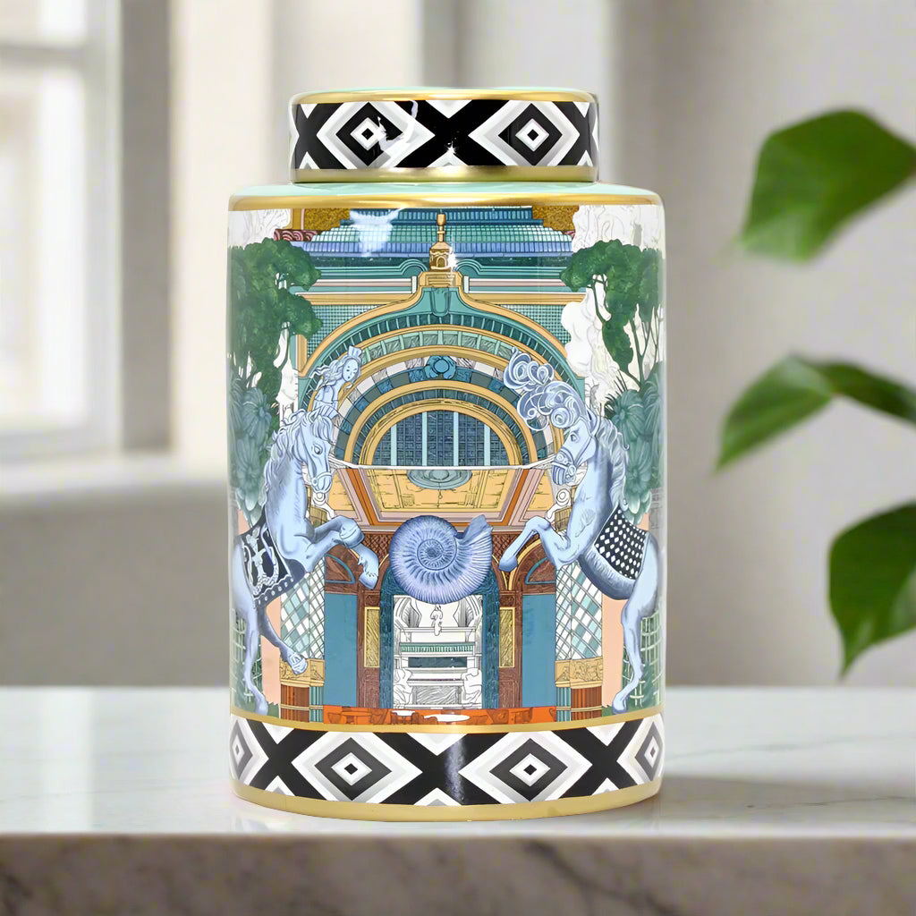 Decorative cylindrical container with artistic design on a white background
