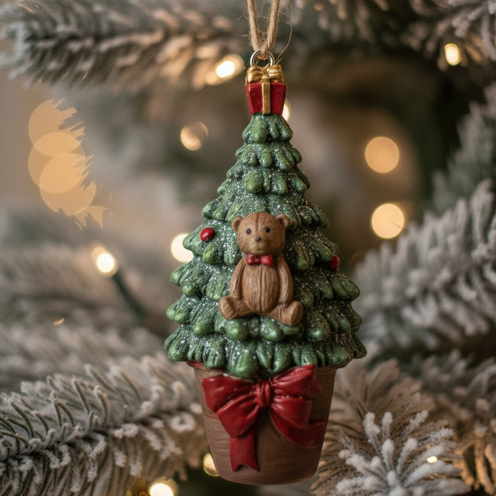 a christmas tree decoration of a christmas tree hanging ona  xmas tree