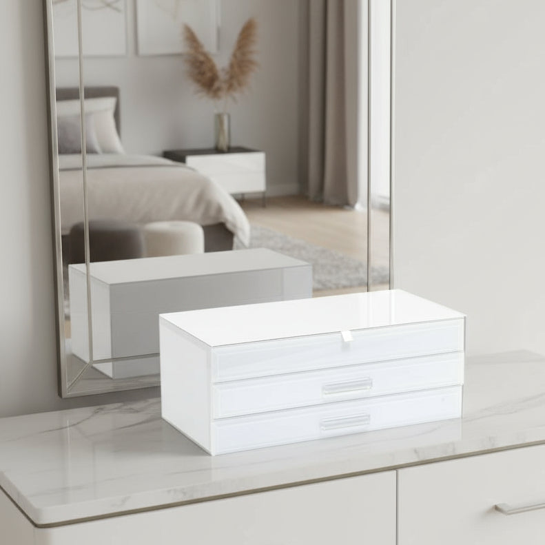 White jewelry box with two drawers on a white background