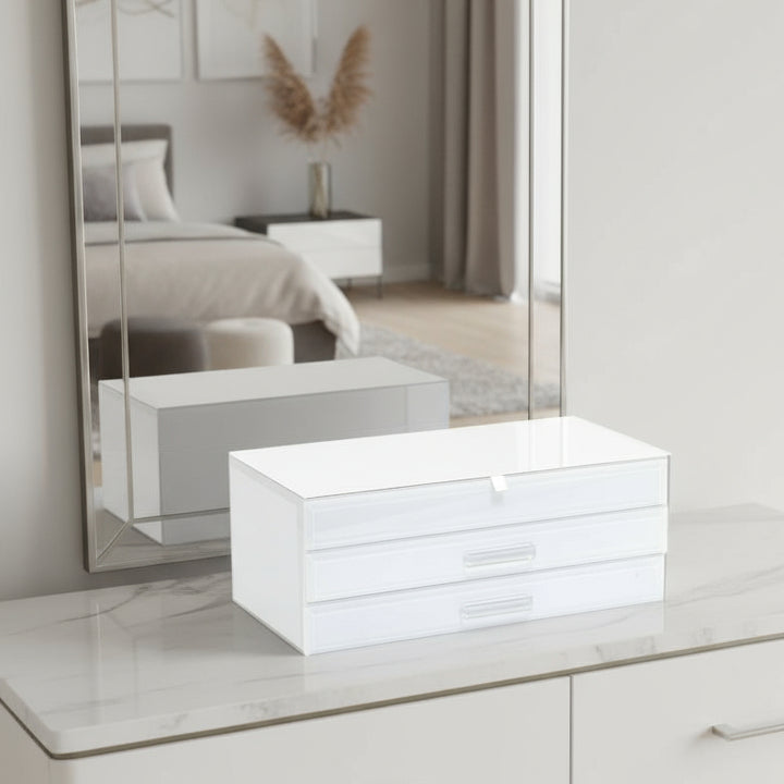 White jewelry box with two drawers on a white background