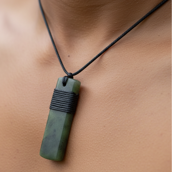 LONG WRAPPED GREENSTONE TOKI  necklace on persons neck